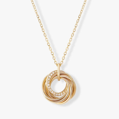 Gold rings necklace with three interlinked circular pendants and crystal-studded border