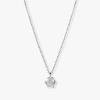 Moissanite diamond pendant on silver chain, round stone in four-prong setting