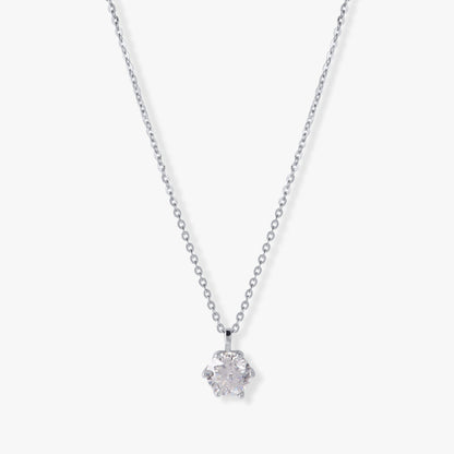 Moissanite diamond pendant on silver chain, round stone in four-prong setting
