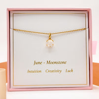Gold-tone June birthstone necklace with round moonstone charm on fine chain