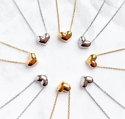 Heart pendant necklace set with gold and silver heart charms on chains