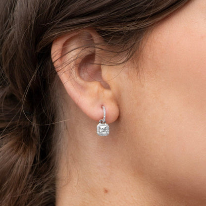 Square drop earrings on ear: sterling silver hoops with pavé edges and square charm