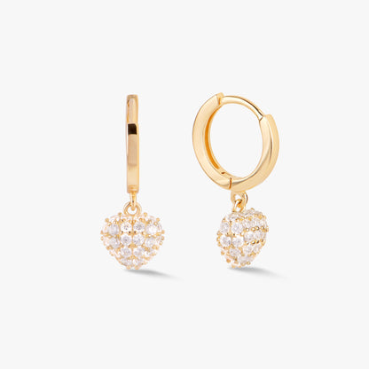 Gold heart charm huggy hoop earrings with pavé-style sparkling stones