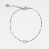 Moissanite diamond bracelet with round halo stone on thin chain and lobster clasp