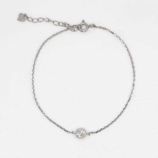 Moissanite diamond bracelet with round halo stone on thin chain and lobster clasp