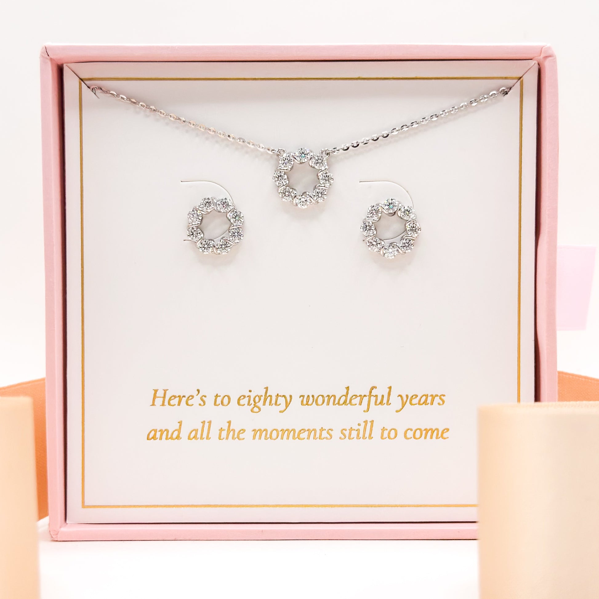 Silver-tone necklace with round clear-stone pendant and matching stud earrings set