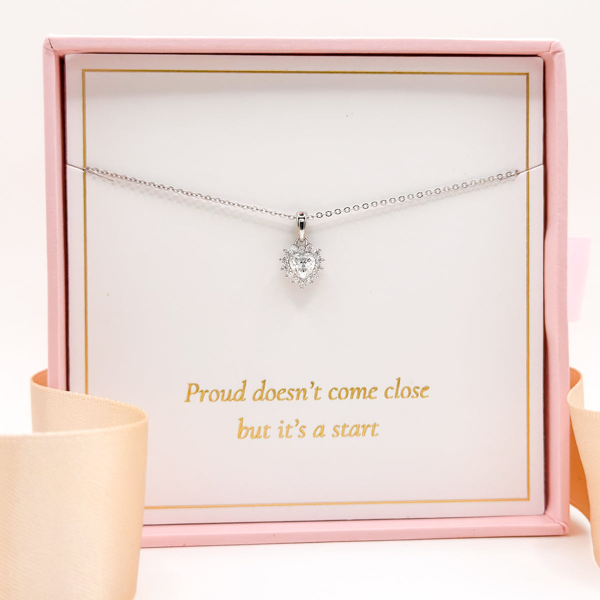 Silver-tone chain necklace with sparkling heart-shaped pendant