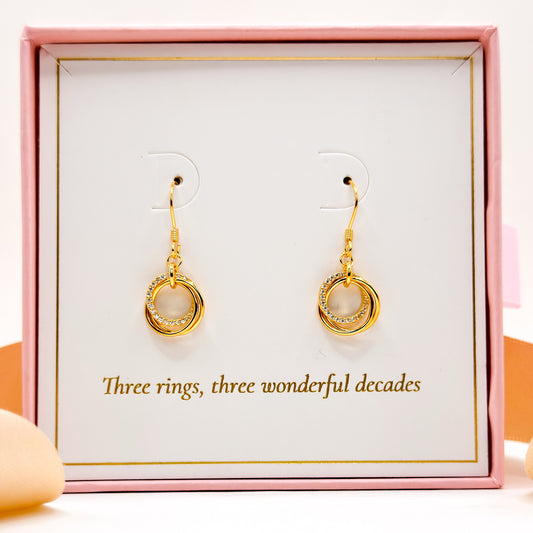 Gold-tone 30th birthday earrings with round ring charm and small hoop drop
