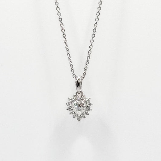 Silver-tone necklace with heart pendant and faceted stones on link chain