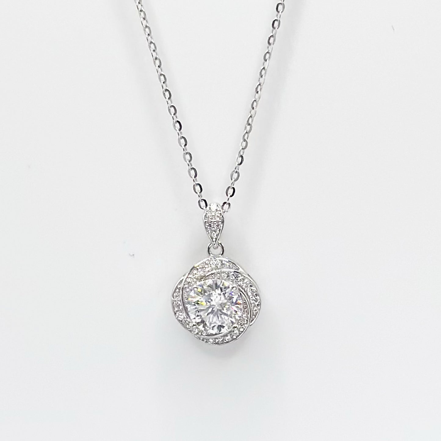 Moissanite floral pendant necklace with round halo center, silver-tone chain