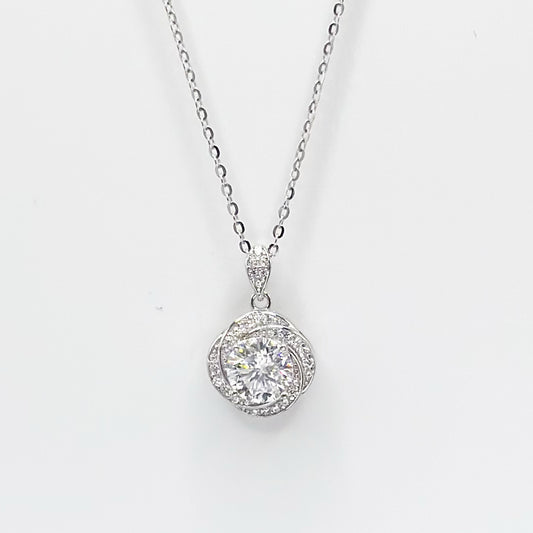 Moissanite pendant necklace with round halo centerpiece and silver-tone chain