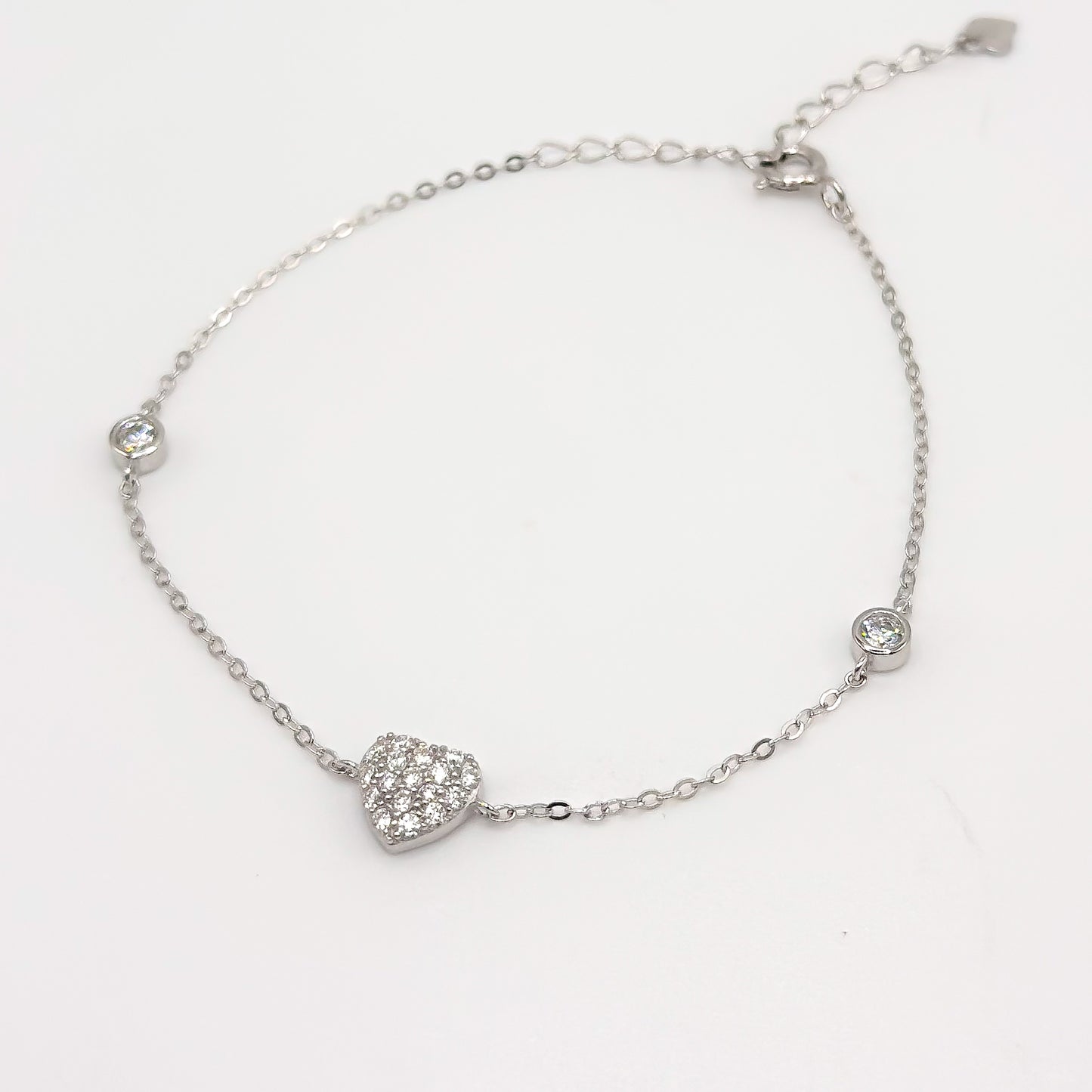 Moissanite heart bracelet with round stone accents