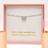 Silver-tone necklace with small chain and heart-shaped gem pendant