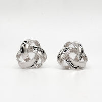 Chunky knot sterling silver hoop earrings with polished swirl design