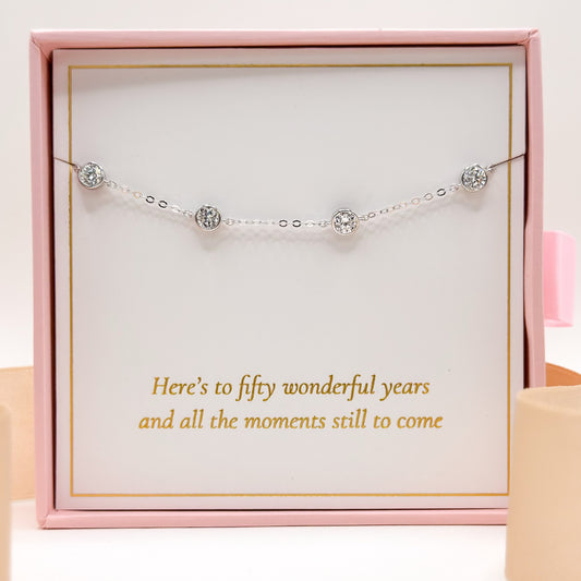 Silver-tone bracelet with five round crystal gems in gift box