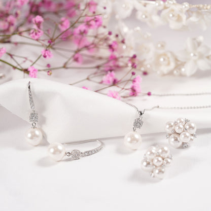 Silver pearl and diamante drop earrings with round sparkling caps and pearl drops