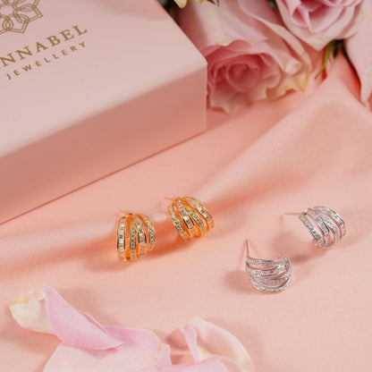 Crystal half hoop earrings set with gold, rose-gold, and silver hoops