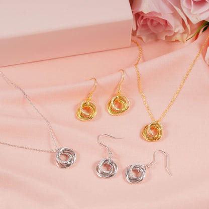 Silver- and gold-tone ring charm necklace and earrings set
