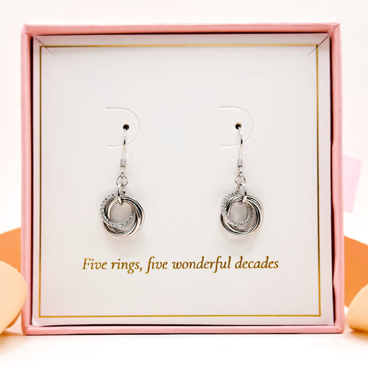 50th birthday dangling earrings with five layered ring charms, silver-tone metal