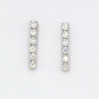 Moissanite tennis drop earrings with six-stone linear design