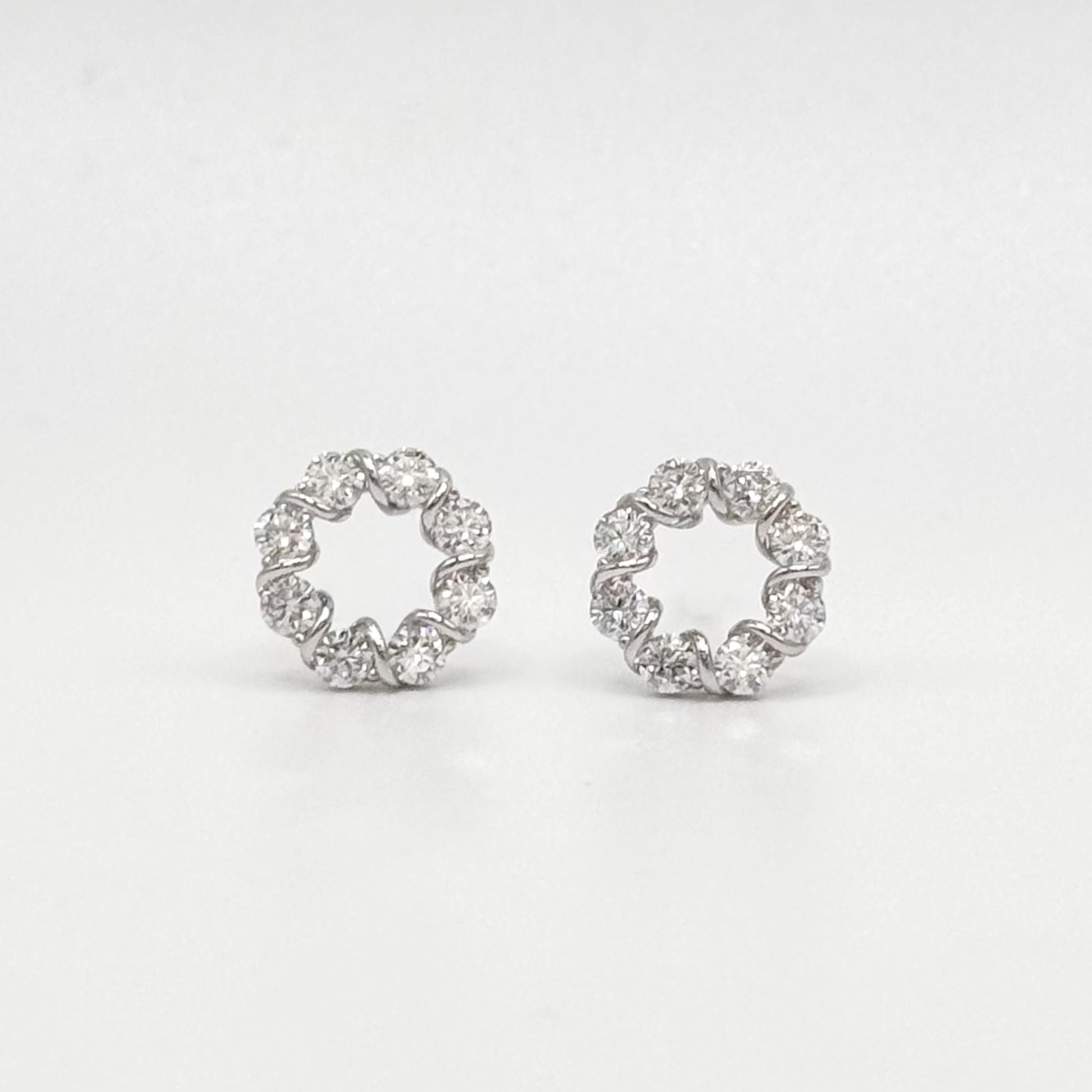 Circle moissanite stud earrings with round crystal stones, silver-tone settings