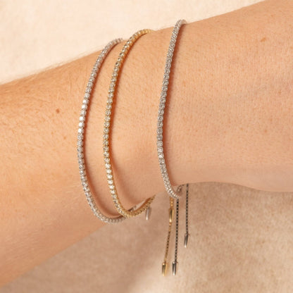 Silver adjustable tennis bracelet with pave stones and dangling adjuster
