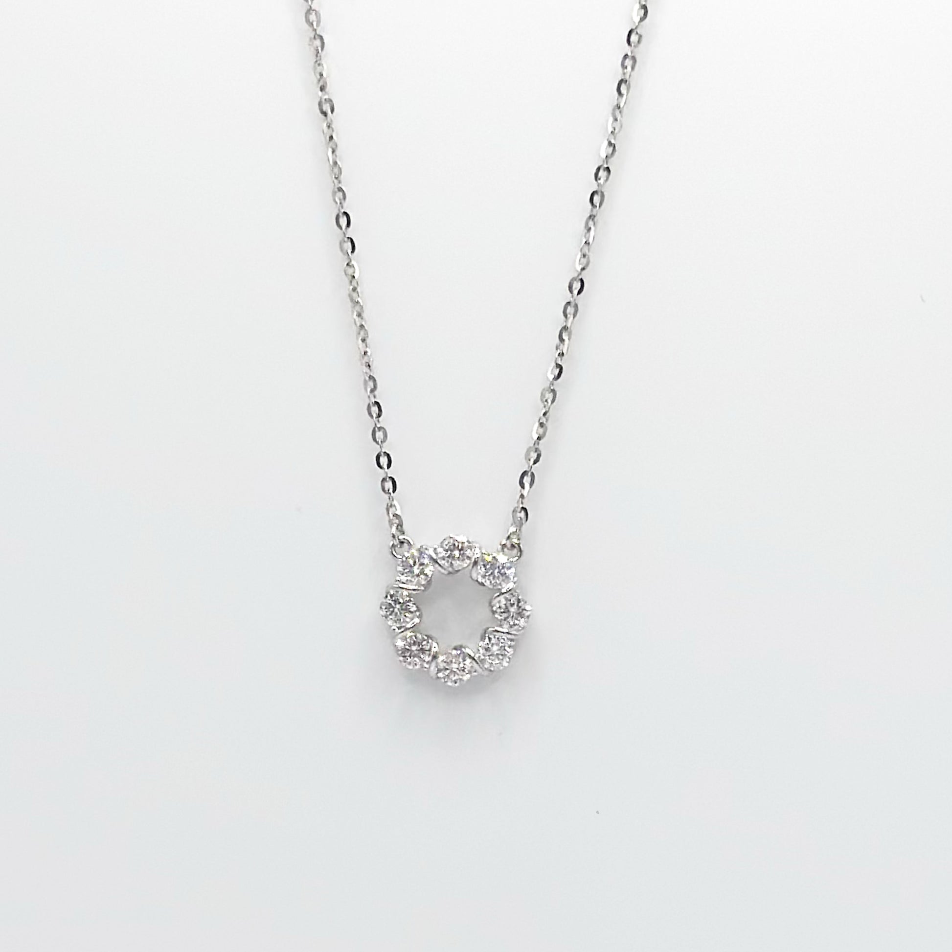 Circle pendant moissanite necklace with silver-tone chain and round stone cluster