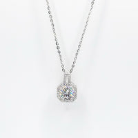 Silver moissanite pendant necklace with round halo solitaire setting on chain