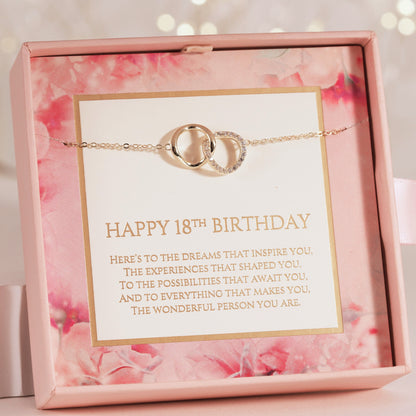Gold tone 18th birthday necklace with interlocking rings pendant on chain