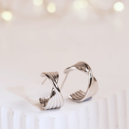 Twisted half hoop earrings, twisted design, silver-tone hoops with hinged back