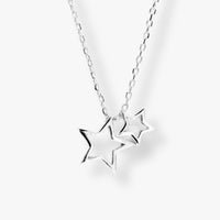 Silver star necklace with two connected star pendants on a link chain