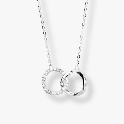 Silver-tone interlocking circles necklace with crystal accents, linked pendant
