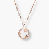 Rose gold moon and star pendant necklace with round bezel and chain