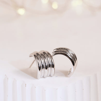 Silver tone chunky half hoop earrings, ribbed coil rings with open cuff