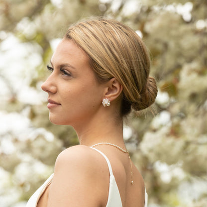 Pearl cluster stud earrings with gold-tone settings