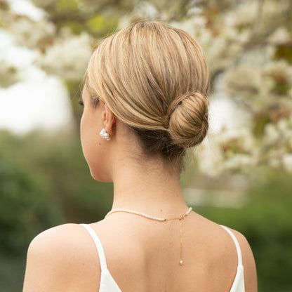 Pearl choker necklace with white pearl beads and small dangling pearl at back
