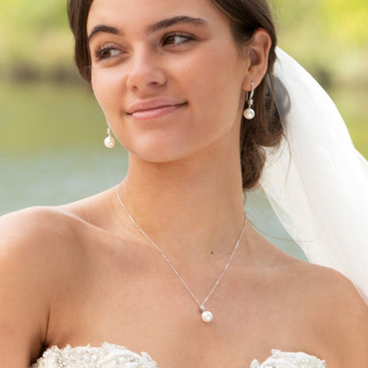 Silver pearl and diamante drop earrings on metal hooks