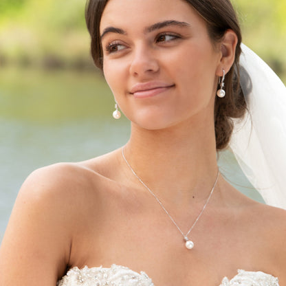 Pearl and diamante necklace with single pearl drop pendant on a fine chain, silver-tone