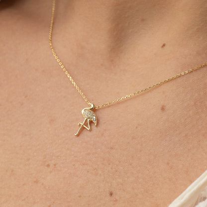 Gold chain flamingo charm necklace with sparkle stone head detail
