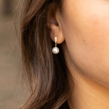 Gold-tone stud with dangling round pearl drop earrings