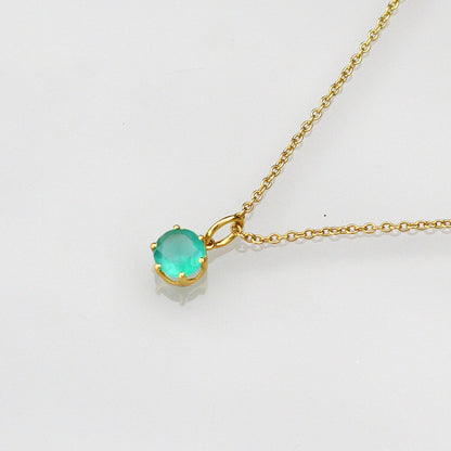 Gold-tone necklace with round green gemstone pendant and link chain