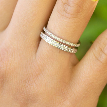 Sterling silver adjustable ring with double row of clear pave stones on finger