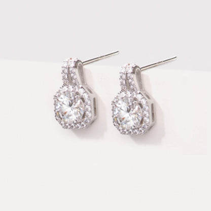 Teardrop diamond stud earrings with pavé halo and white metal posts