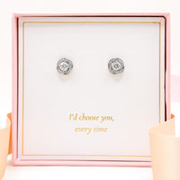 Moissanite silver stud earrings with round faceted stones, pair of sparkling studs