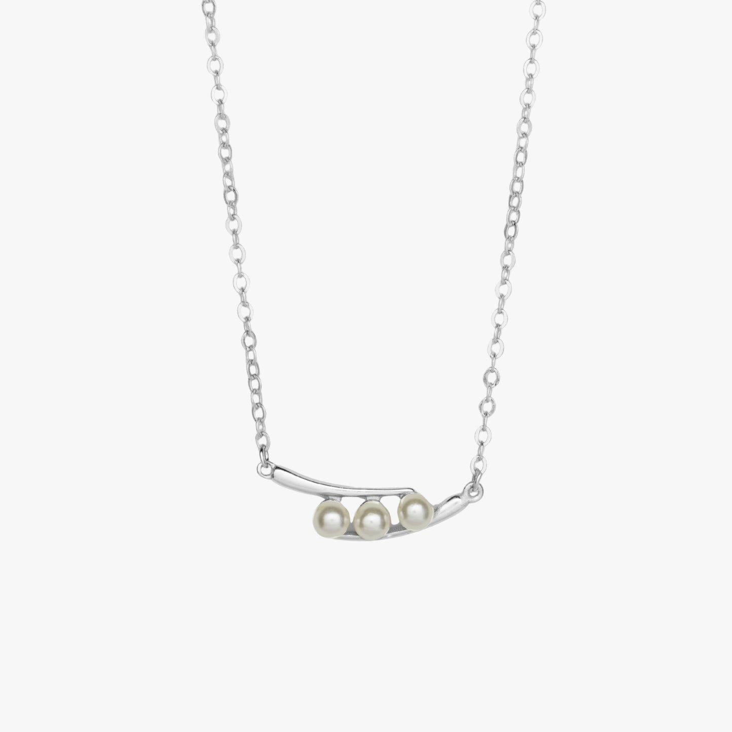 Silver peas-in-a-pod necklace with three faux pearl pods on a chain