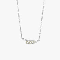 Silver peas-in-a-pod necklace with chain, curved crescent bar, three pearl beads