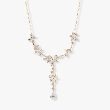 Gold bridal crystal floral necklace with starburst links and teardrop drop pendant