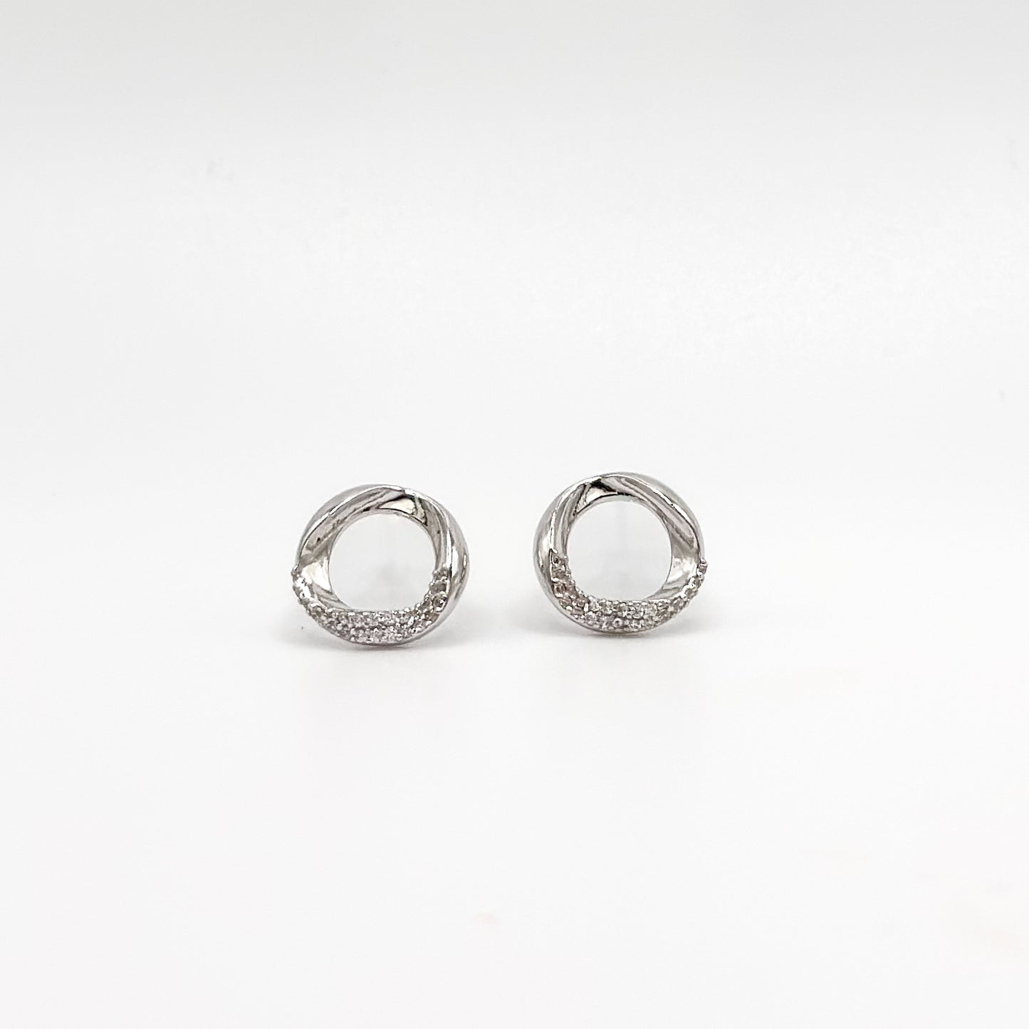 Sterling silver circle stud earrings with small crystal pavé ring