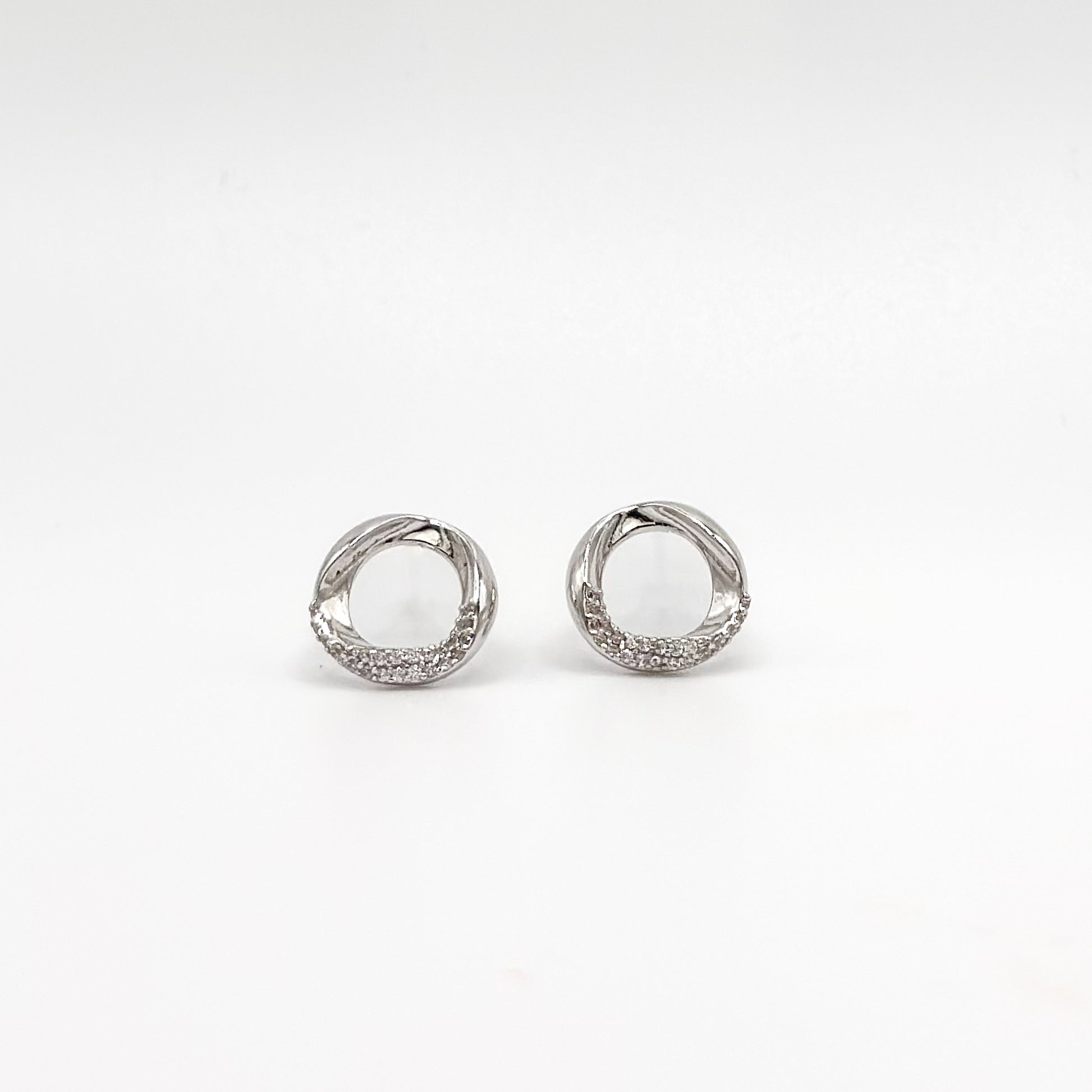 Sterling silver circle stud earrings with small crystal pavé ring