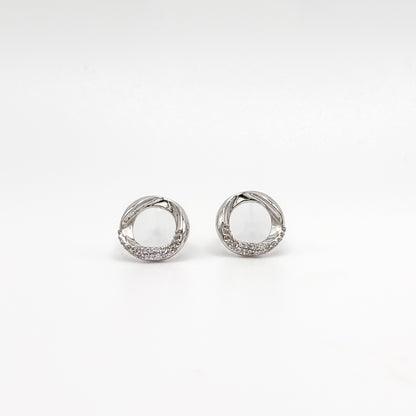 Sterling silver circle stud earrings with small crystal pavé ring